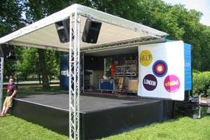 empty open air stage with speakers and sound equipment